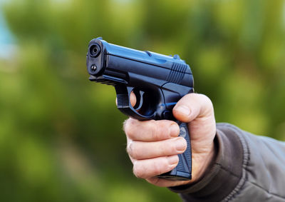 Gun in male hand