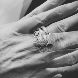 Digital composite image of cropped hand wearing ring