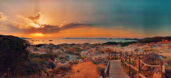 Scenic view of landscape against sky during sunset