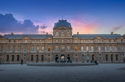 View of historic building against sky at dusk