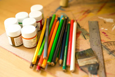 High angle view of colored pencils on table