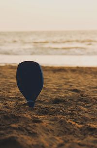 Close-up of heart shape on beach