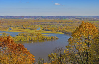 Scenic view of lake against sky during autumn