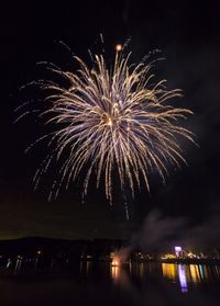 Firework display at night