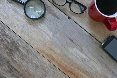 High angle view of coffee cup on table