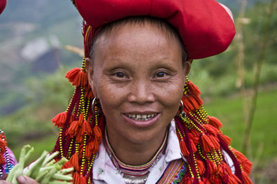 Close-up portrait of a smiling young woman