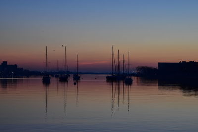 Silhouette of marina at sunset