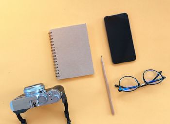 High angle view of smart phone on table