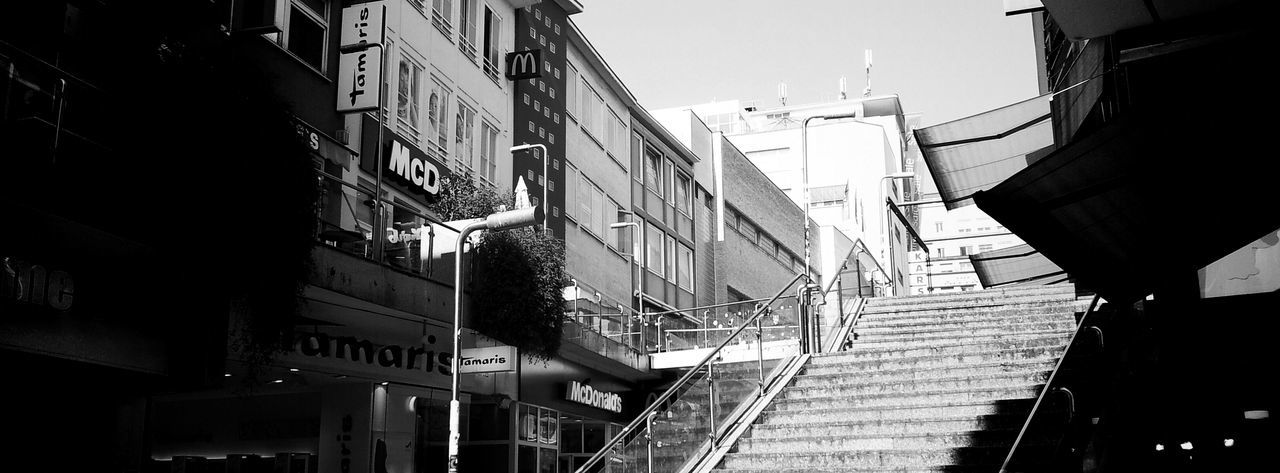 architecture, building exterior, built structure, day, steps and staircases, no people, outdoors, city, low angle view, clear sky, sky