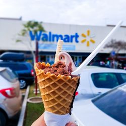 Hand holding ice cream cone