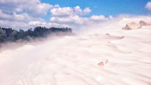 Aerial view of landscape against sky during winter