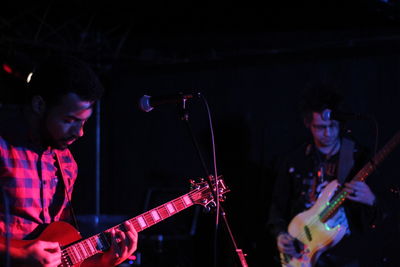 Young men performing at nightclub