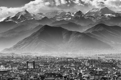 Aerial view of cityscape against sky