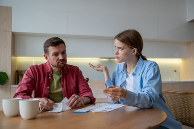 Female friends working at creative office