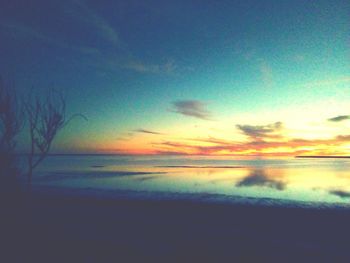 Scenic view of sea at sunset