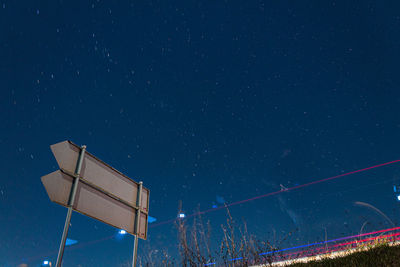 Low angle view of illuminated stars against sky at night