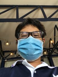 Portrait of young man wearing sunglasses