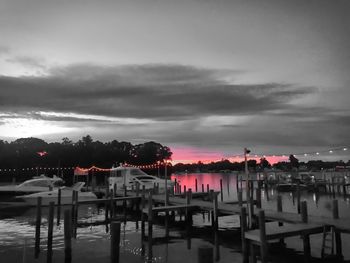 Boats moored at harbor
