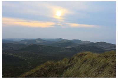 Scenic view of mountains against sky