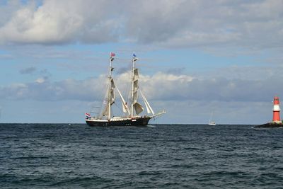 Sailboat sailing in sea
