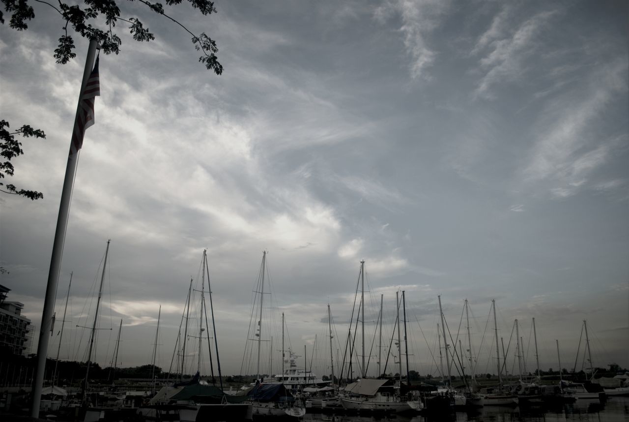 sky, nautical vessel, water, moored, cloud - sky, boat, sea, transportation, harbor, mode of transport, cloudy, cloud, mast, nature, sailboat, tranquility, tranquil scene, outdoors, no people, beauty in nature