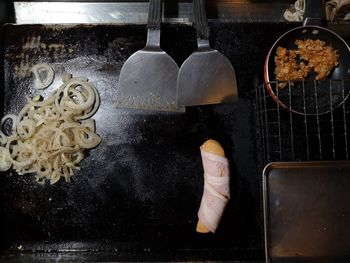 Close-up of person preparing food on table