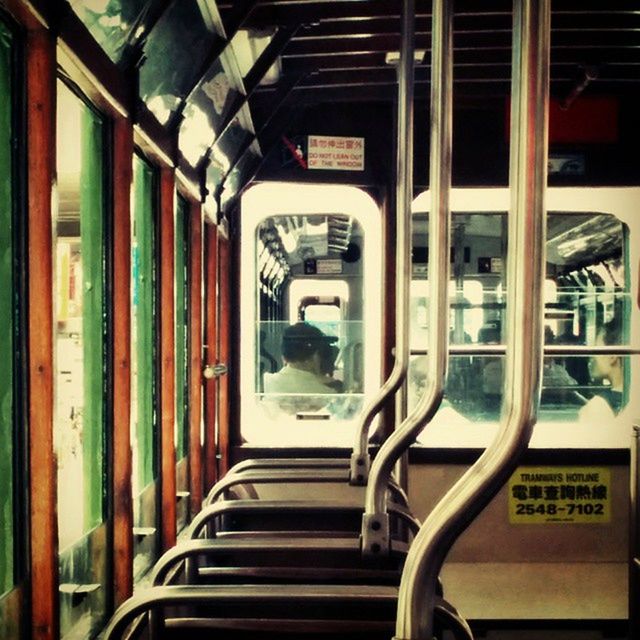 transportation, mode of transport, land vehicle, indoors, vehicle seat, car, vehicle interior, travel, public transportation, absence, in a row, window, empty, bus, architecture, seat, built structure, day, passenger train, incidental people