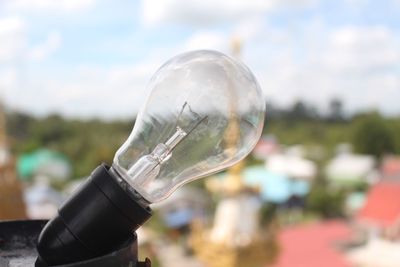 Close-up of light bulb on bottle