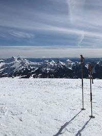 Scenic view of snow covered mountain against sky