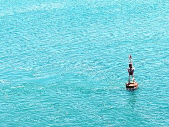 High angle view of man sailing in sea