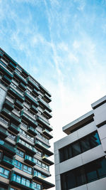 Low angle view of modern building against sky