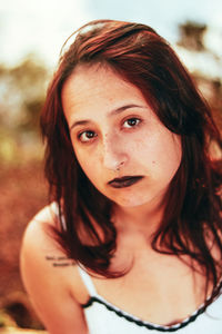 Close-up portrait of young woman