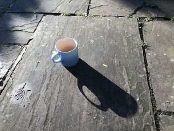 High angle view of coffee cup on table