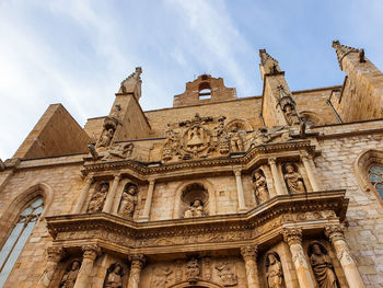 Low angle view of historical building against sky