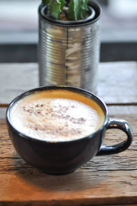 Close-up of cappuccino on table