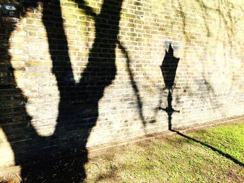 Shadow of people on wall
