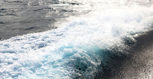 Sea waves splashing on shore