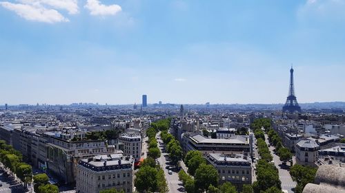 High angle view of city buildings against sky