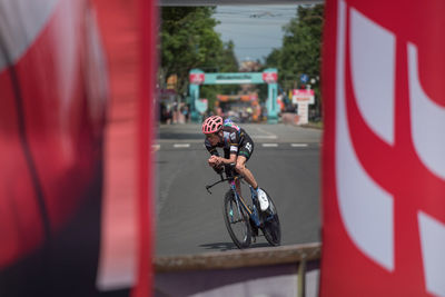 Man riding bicycle in city