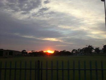 Scenic view of landscape at sunset