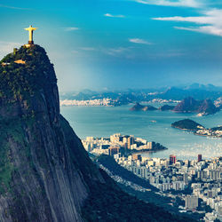 Christ the redeemer on mountain against sky