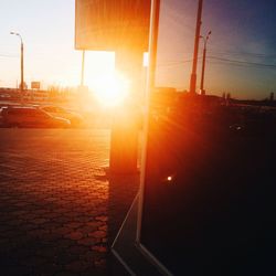 Close-up of sunrise against sky during sunset