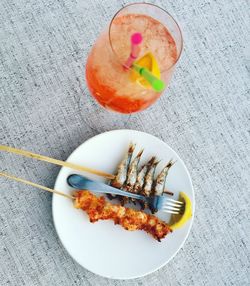 High angle view of fish served on table