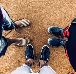 Low section of people standing on floor