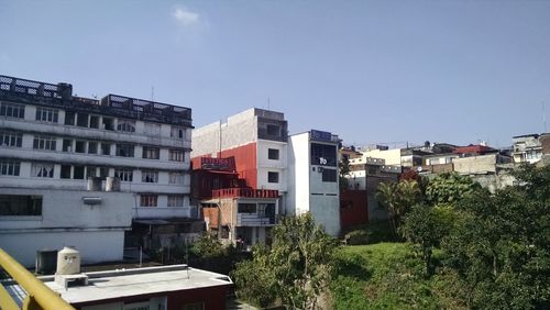 Residential buildings against clear sky