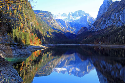 Beautiful reflection at gosau lake in autumn