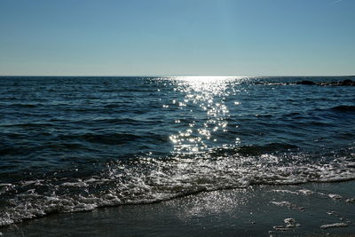 Scenic view of sea against clear sky