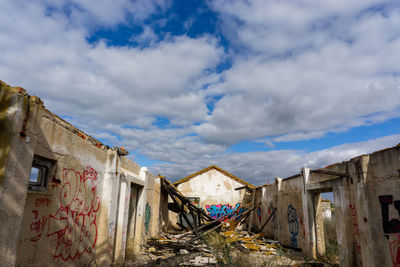 Abandoned buildings against sky