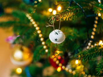 View of decoration hanging on christmas tree at home