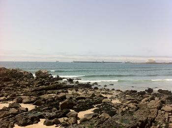 Scenic view of sea against clear sky